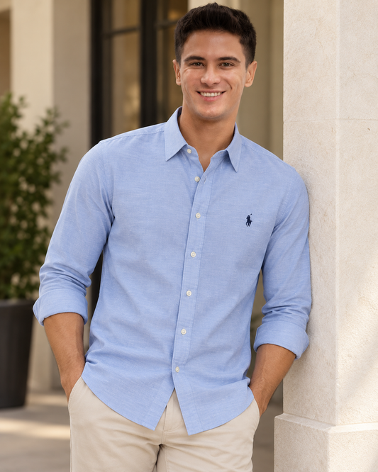 Model wearing the baby blue long-sleeve shirt, lifestyle view