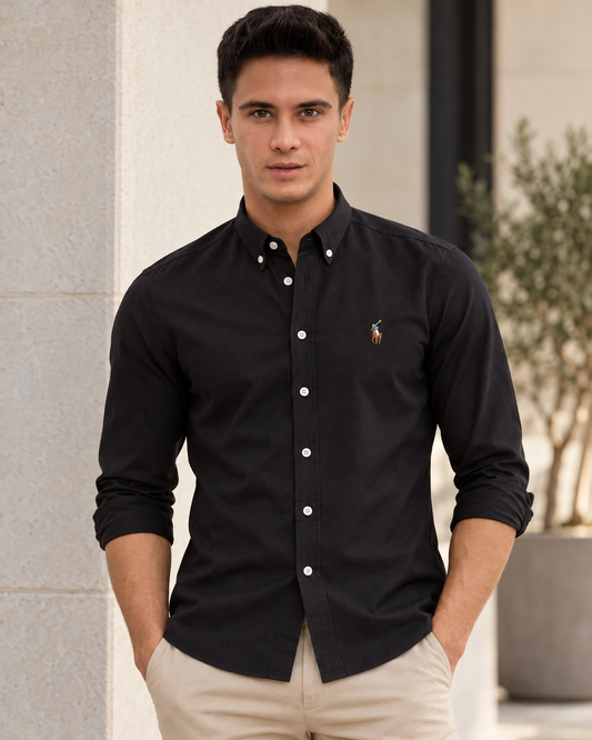 Model wearing the black slim fit Oxford button-down shirt, lifestyle view