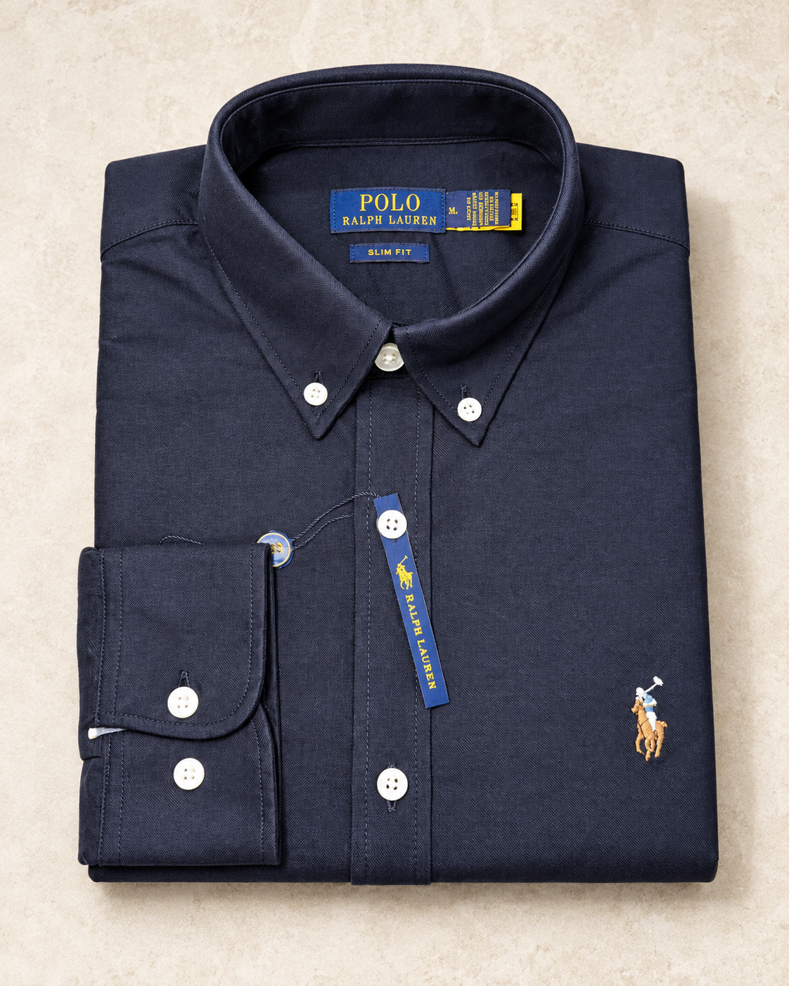 Navy slim fit Oxford button-down shirt folded, flat lay
