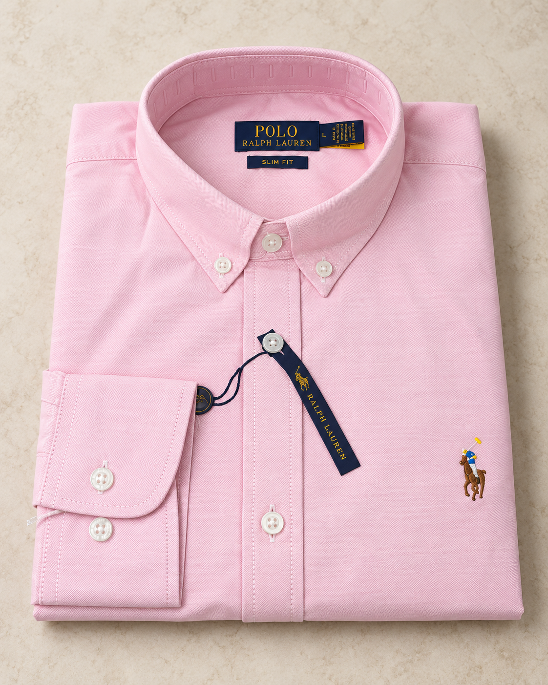 Pink slim fit Oxford button-down shirt folded, flat lay
