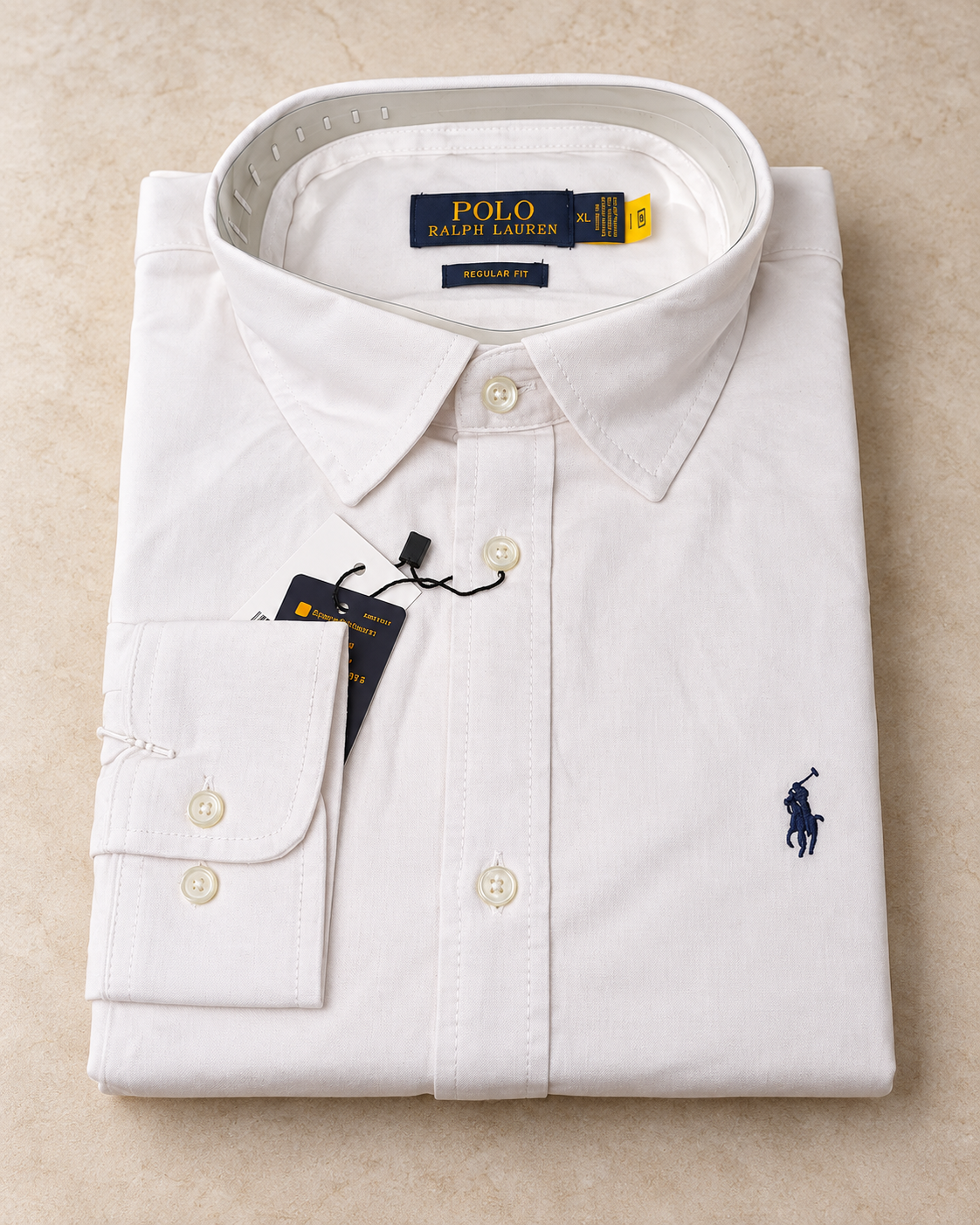 White slim fit Oxford button-down shirt folded, flat lay