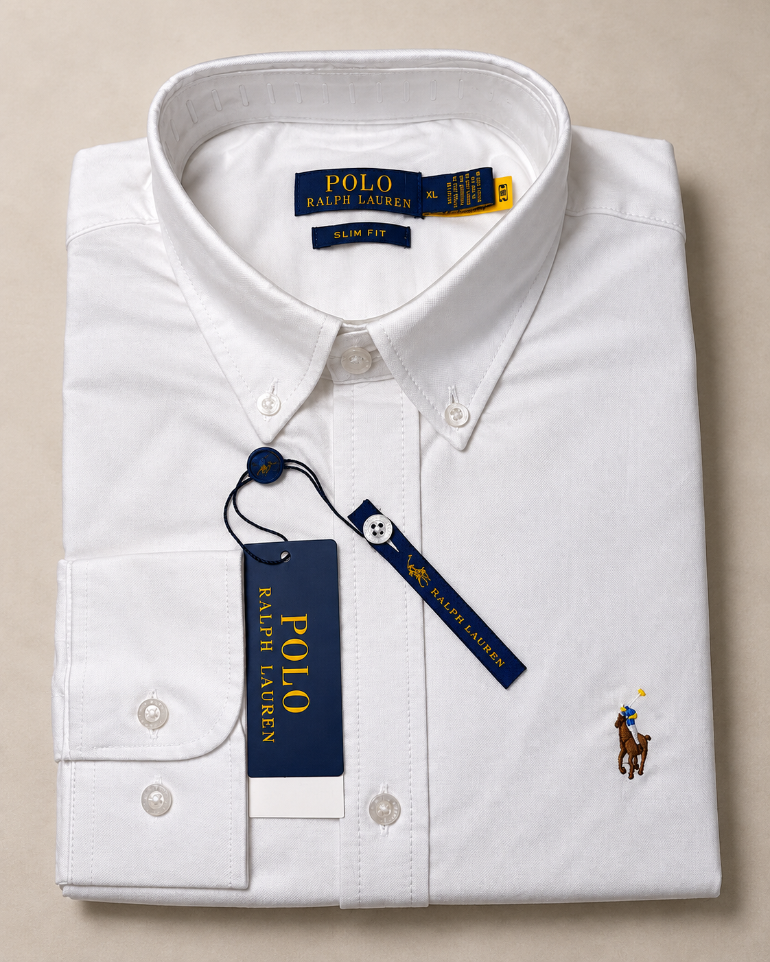 White slim fit Oxford button-down shirt folded, flat lay